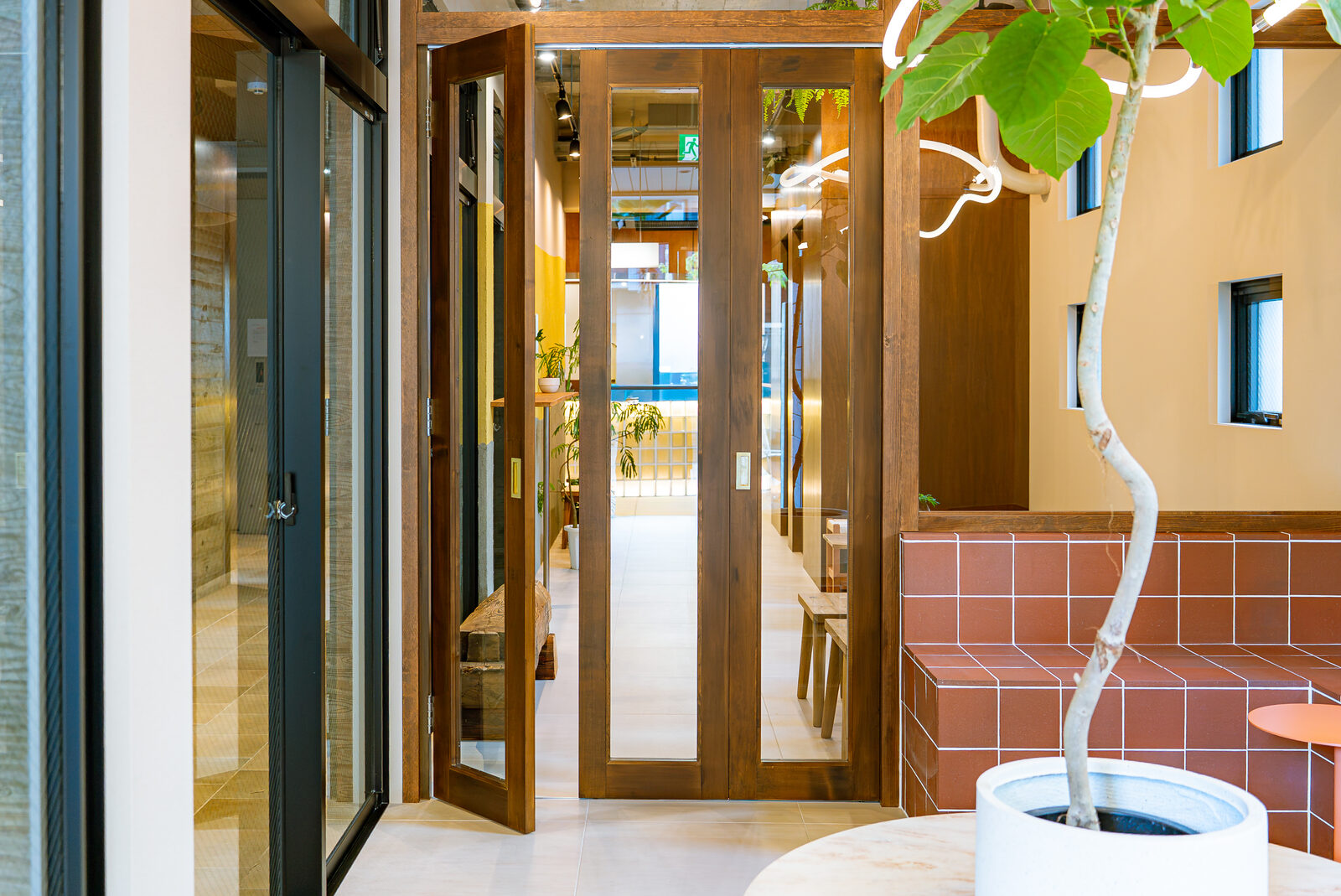 The entrance, built around the existing timber doors